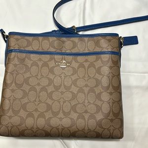 Coach brown/tan crossbody bag with blue trim.  Lightly used